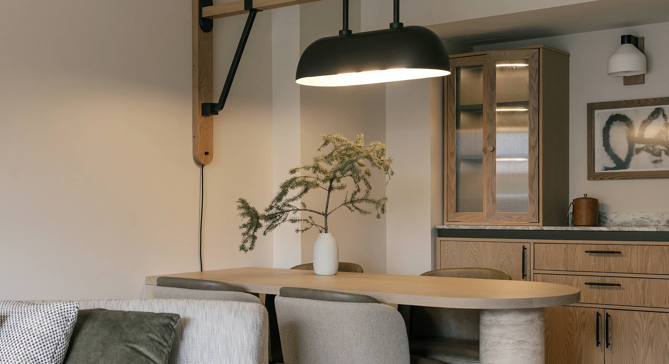 Spacious suite living area at Rimrock Banff, Emblems Collection featuring elegant furnishings and mountain-inspired design.