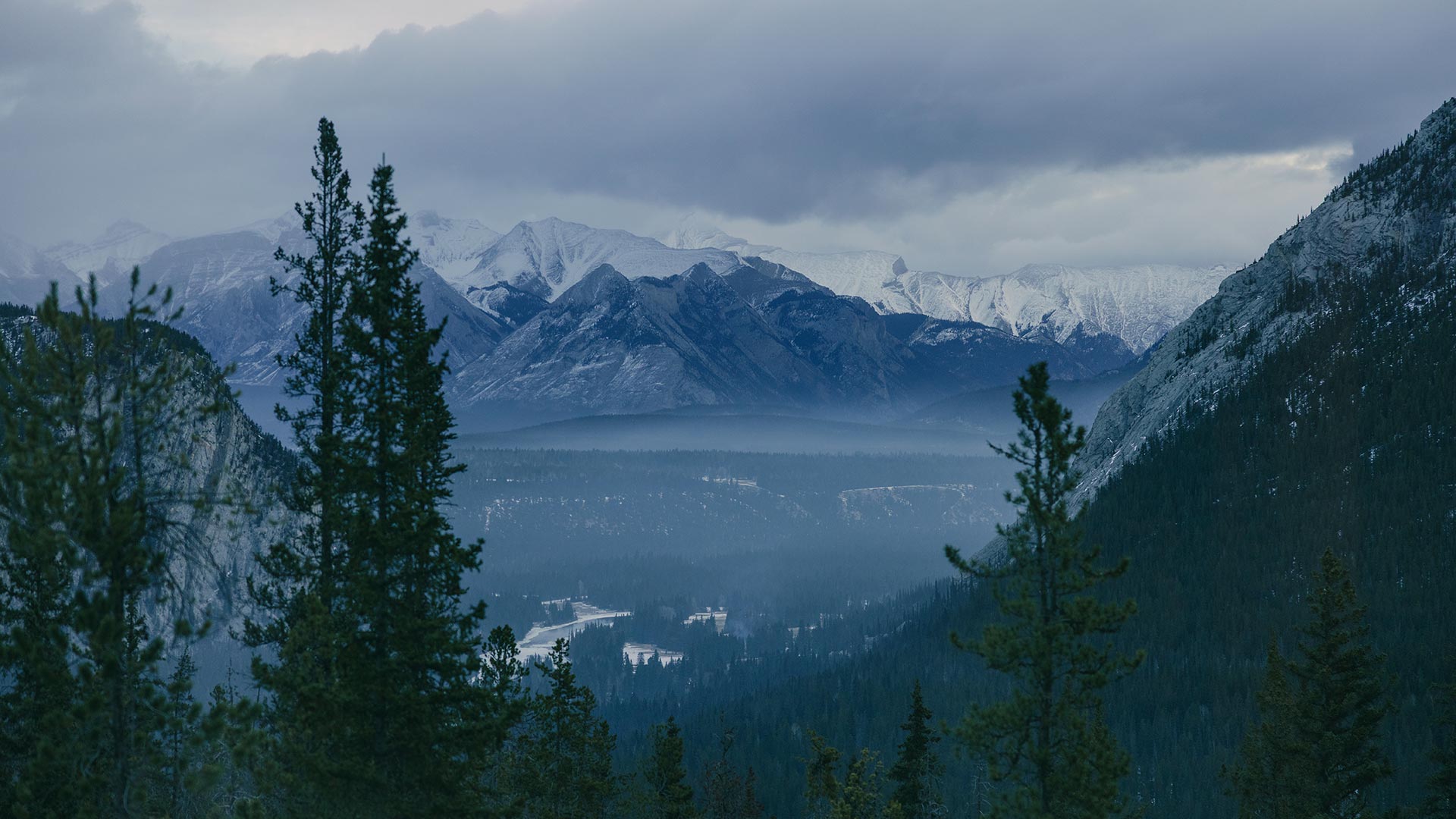 Mountain view from a guest room window at Rimrock Banff, Emblems Collection overlooking Banff National Park and the Bow Valley below.