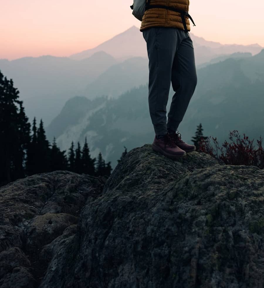A woman enjoys a hike on a beautiful Autumn day on Sulphur Mountian in Banff National Park.