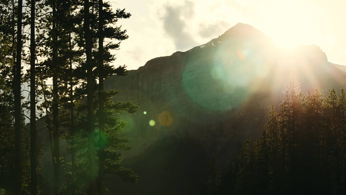Luxury Travel means views of the mountains in Banff when the sunlight representing movement of light