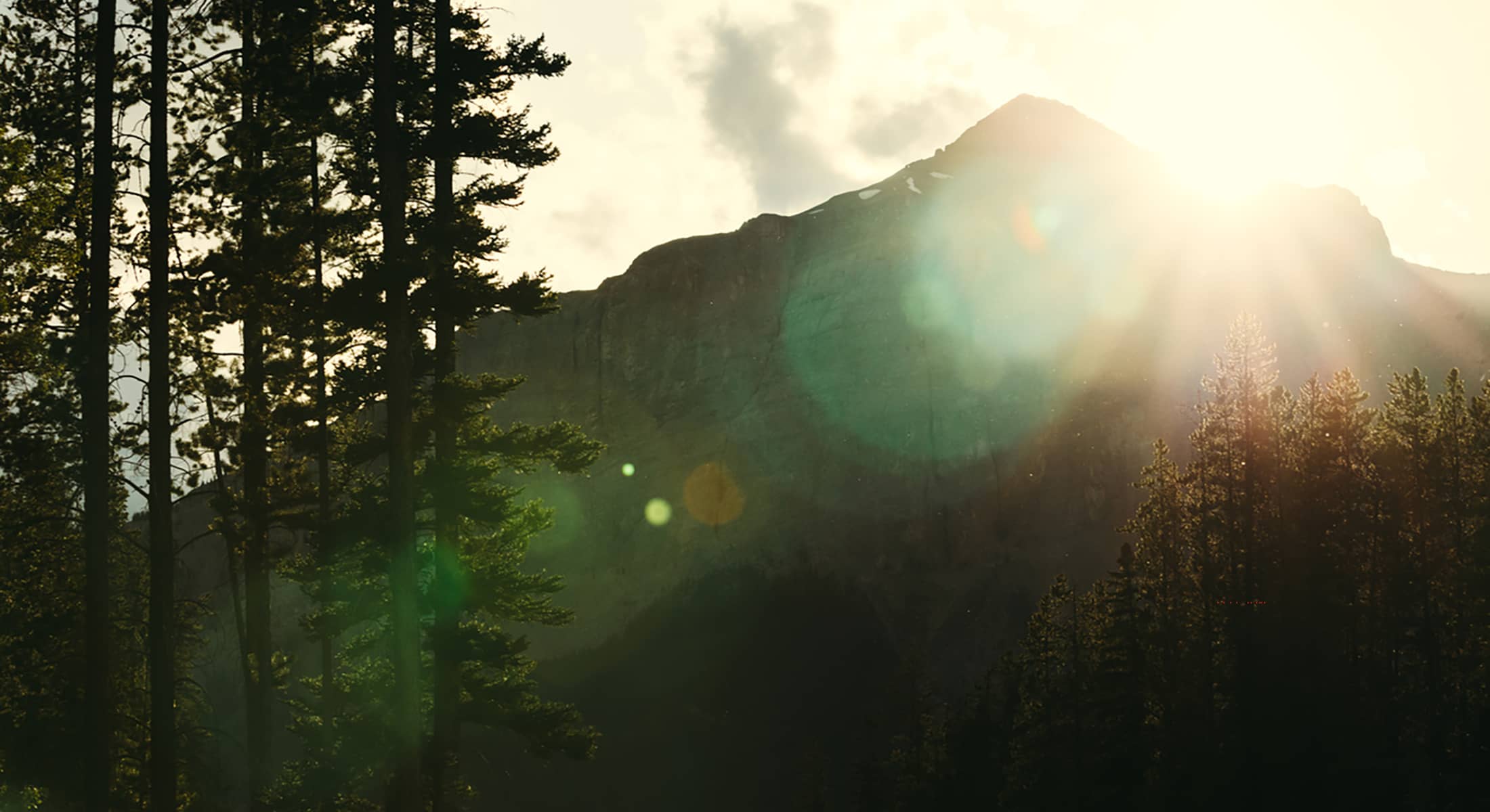 Luxury Travel means views of the mountains in Banff when the sunlight representing movement of light