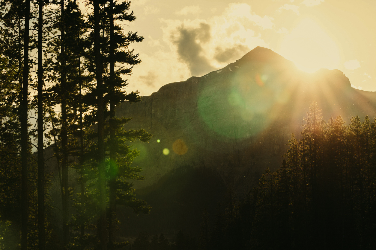 Luxury Travel means views of the mountains in Banff when the sunlight representing movement of light