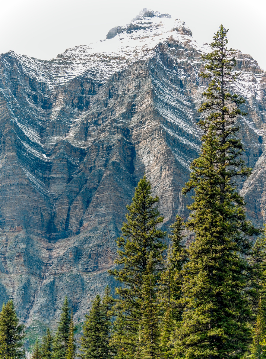 Mountain with snow and sky near Moraine Lake.